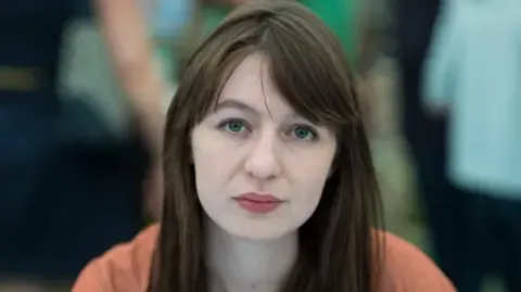 Irish author Sally Rooney claims she will not enter the UK due to arrest fears